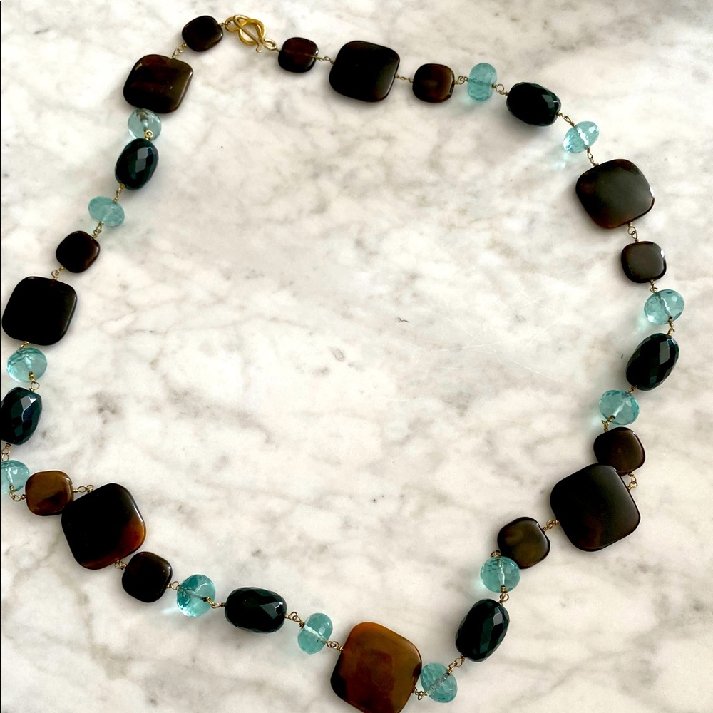 Crystal and dark tortoise like necklace
